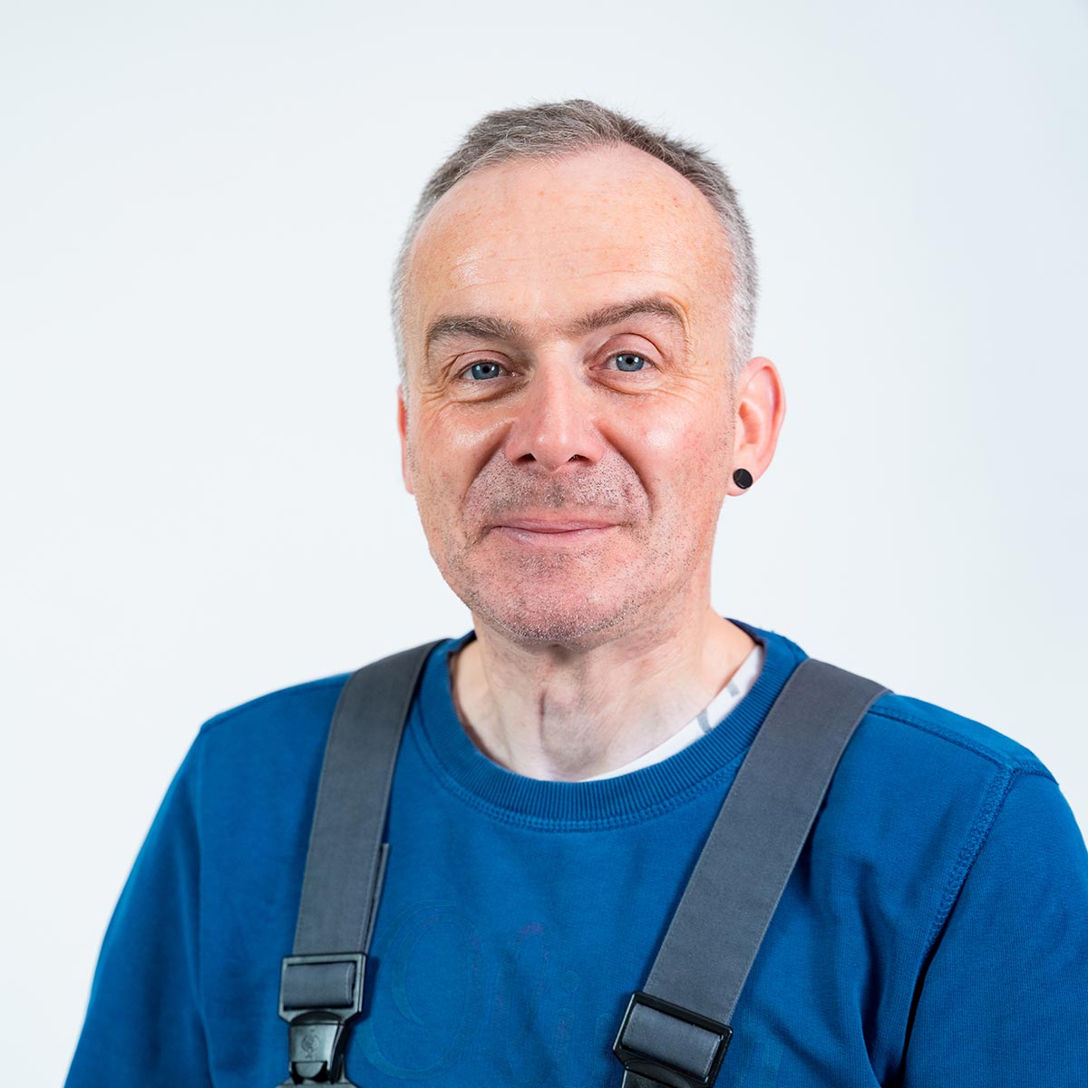 Porträt von Stefan Wisser, Teammitglied von Solingen.Business, vor hellem Hintergrund
